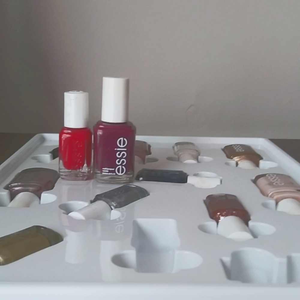 Essie 12 days of color gift set shipped in small case (box water damaged)